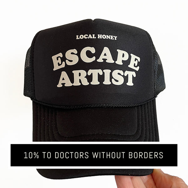 'ESCAPE ARTIST' TRUCKER HAT - GLOW IN THE DARK!
